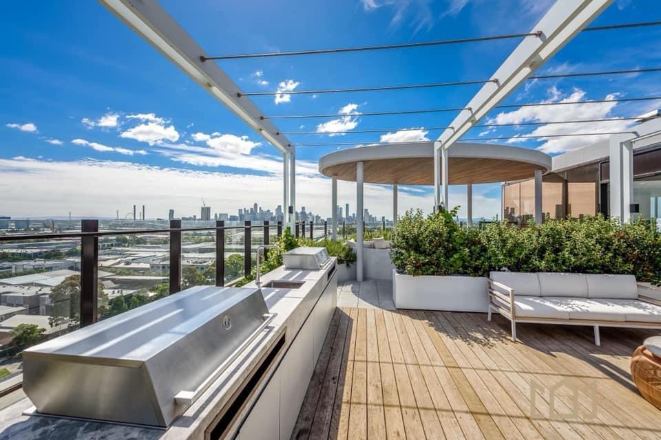 Residential rooftop solar panels soaking up the sun on a bright day in Gold Coast, promoting clean energy.
